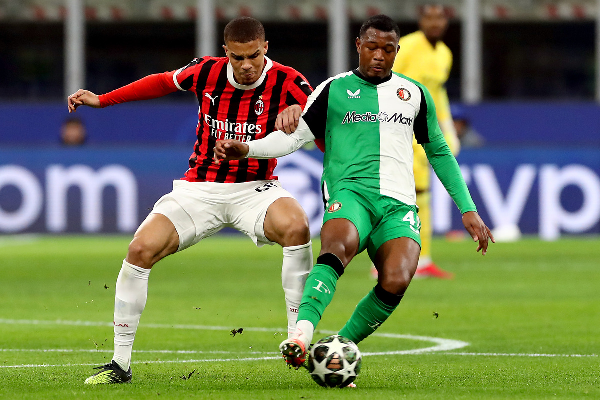 Milan, Italy - February 18: Zepiqueno Redmond de Feyenoord is disputed by Malick Thiaw of AC Milan in the match of the second stage of the UEFA Champions League 2024/25 between AC Milan and Feyenoord at the San Siro stadium on February 18, 2025 in Milan, Italy. (Photo by Marco Luzzani / Getty Images)