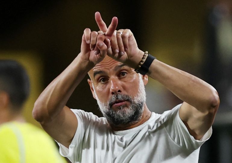 Manchester City manager Pep Guardiola, reacts full time before additional time at the Club World Cup